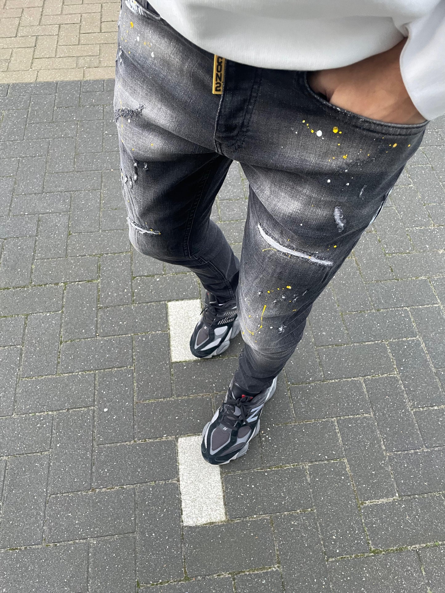 Icon2 zwarte slimfit jeans heren - stretch -gele verfspetters